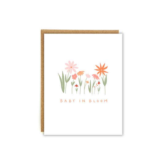 Colorful flowers blooming with the phrase "Baby in bloom"